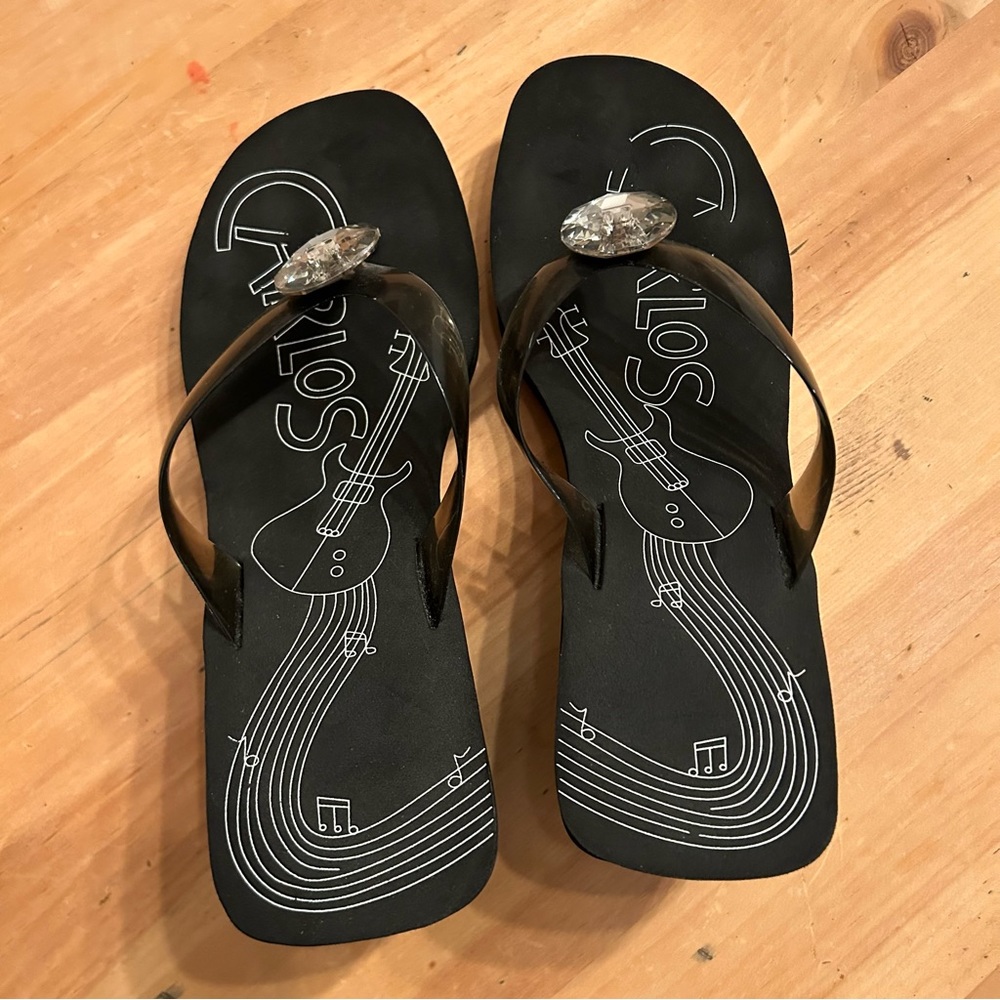 Black platform sandals with a clear strap thru toes, and pendant. Size 9 - Picture 2 of 6